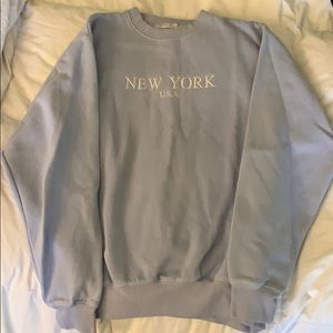 Light blue crew neck